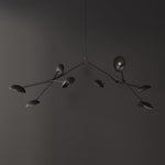 101 Copenhagen Drop Chandelier - Bronze turned on and off