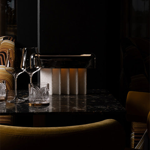 Beetle lamp at a intimate restaurant table at Fume