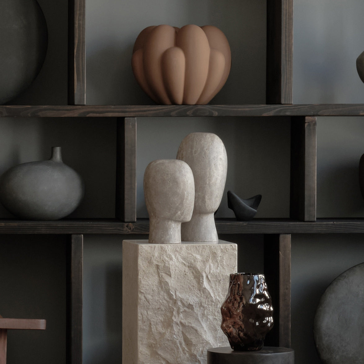 Two head sculptures