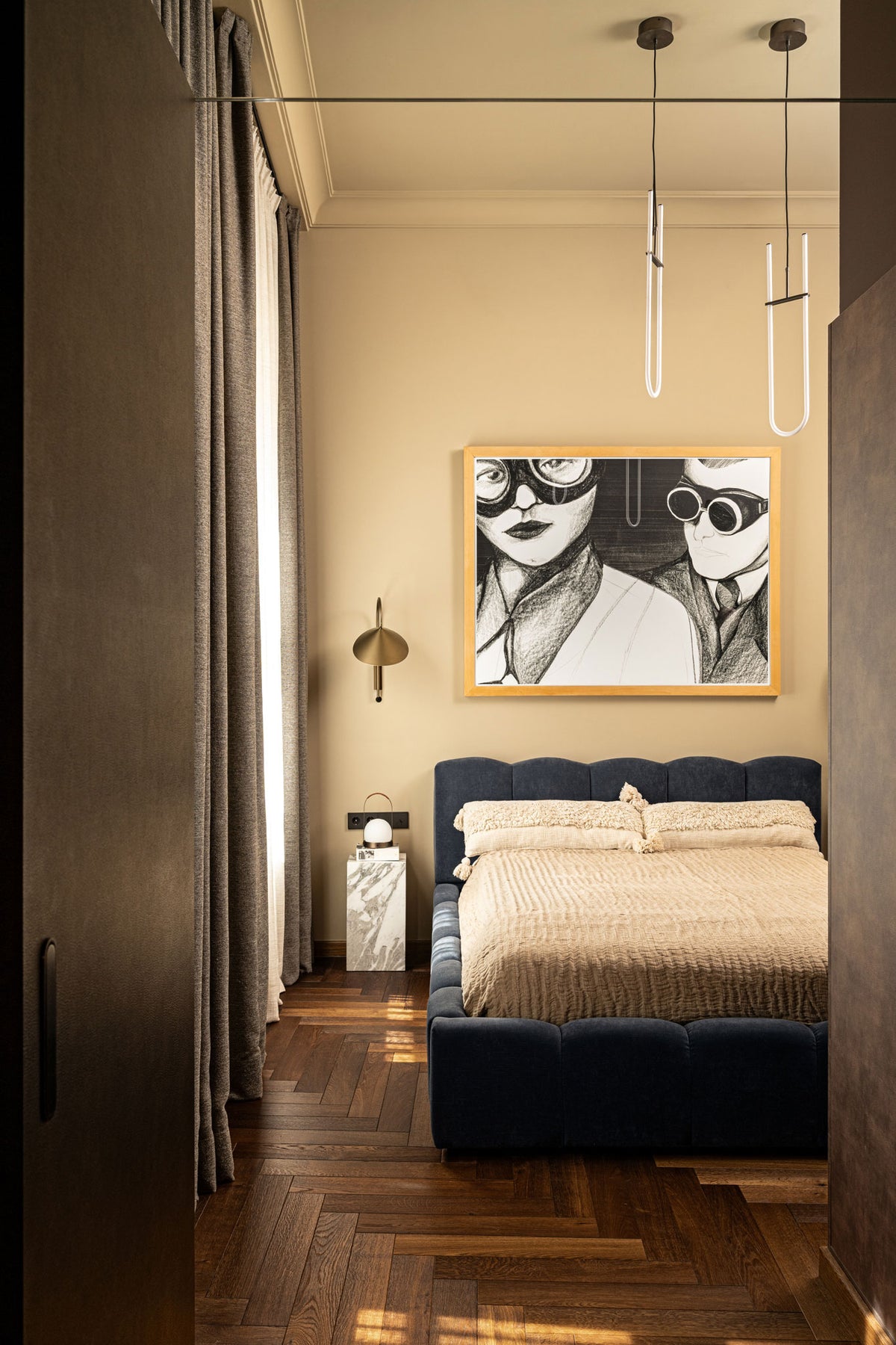 Bedroom in Budapest apartment with Curve Pendant lamps from 101 Copenhagen
