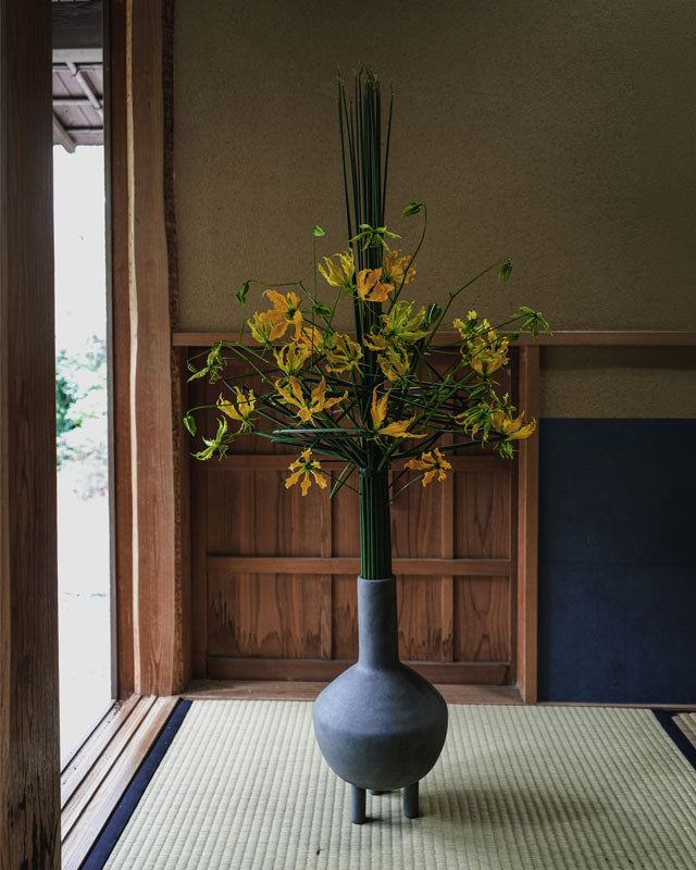 Duck Vase with yellow and green botanical arrangements by Heino Hikaru