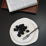 101 Copenhagen Native plates with berries and black Kogei fork