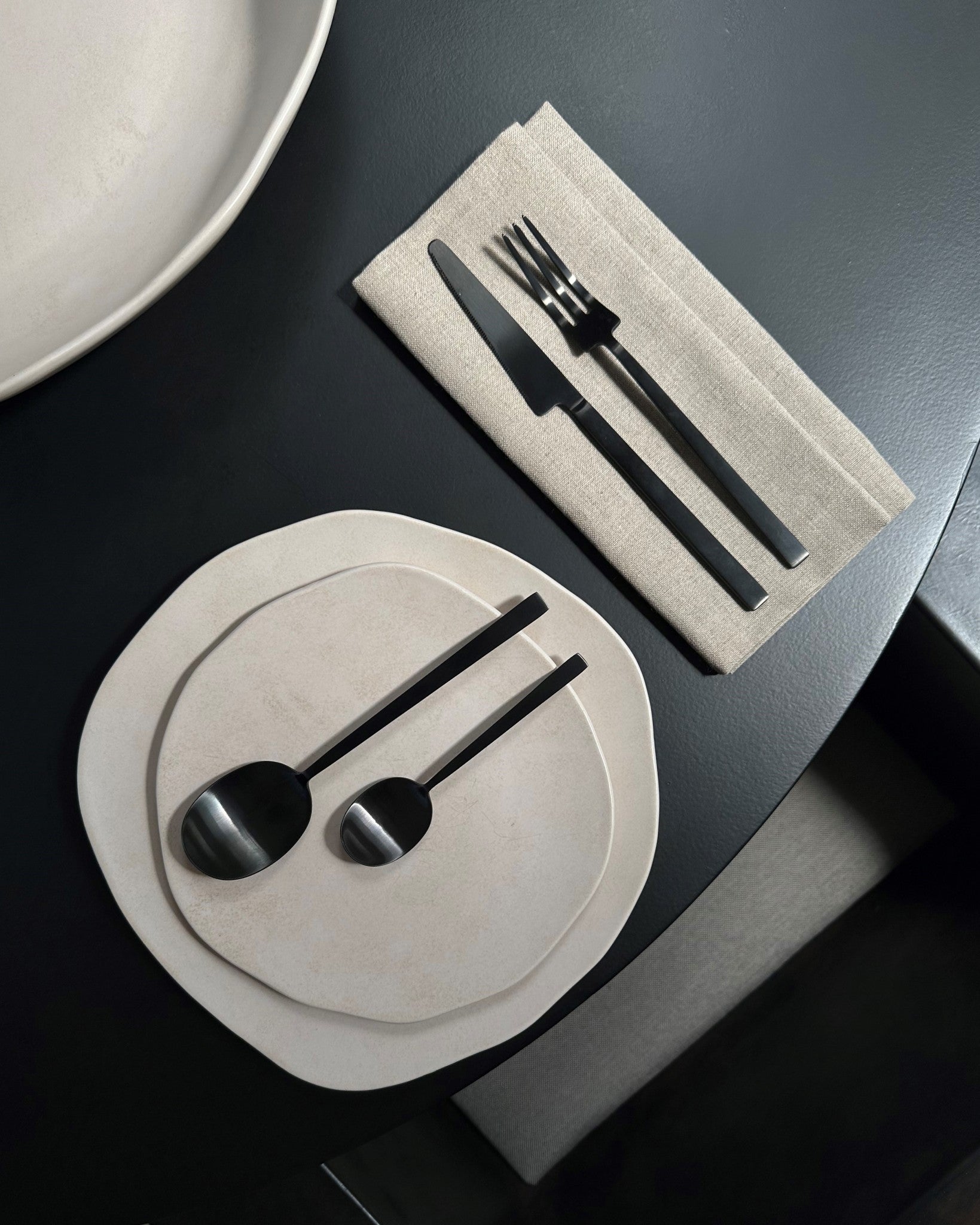 101 Copenhagen Kogei Cutlery - Black on Native plates