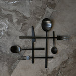 101 Copenhagen Kogei Salad Servers and cutlery - Black on light marble