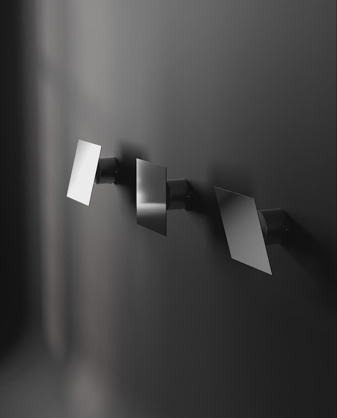 3 directions of Chameleon Wall lamp in Chrome lit and off.