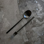 101 Copenhagen Kogei Salad Servers - Black on light marble